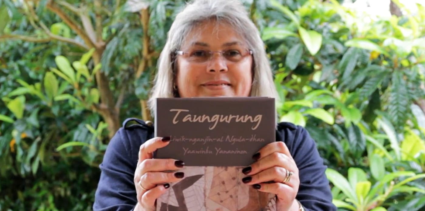 Aunty Lee Healy holding the Taungurung Dictionary. Photo © Jane Curtis